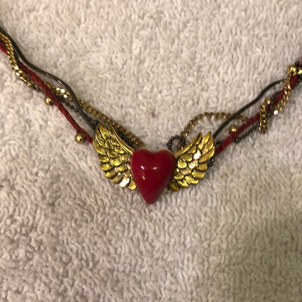 Betsy’s Johnson redwing rocket necklace